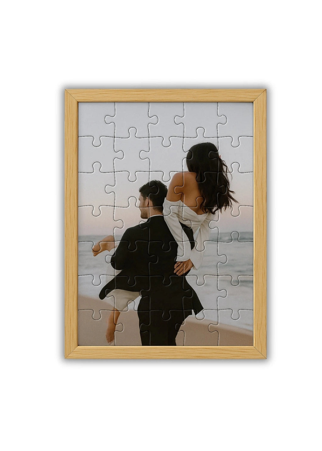 custom wooden puzzle with a photo of a couple enjoying a peaceful moment by the sea with a minimalist woodent frame